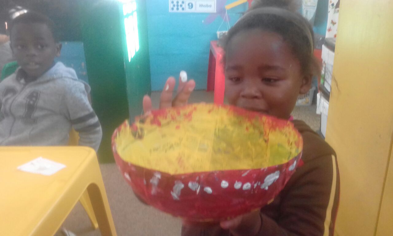 Working with paper mache at Funimfundo Pre-school