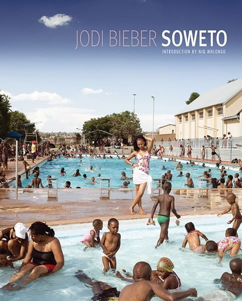 Cover of 'Soweto' by Jodi Bieber. 'Soweto' contemplates daily lived realities where here, as elsewhere, South Africans are continually reinventing themselves and their urban space.